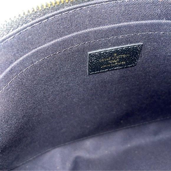 Louis Vuitton Pochette 
Monogram Empreinte Leather - Picture 7 of 9